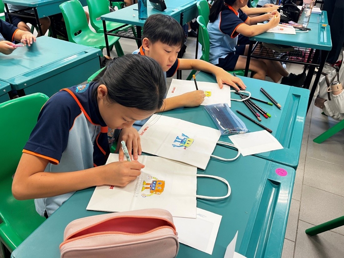Decorating children’s day goodie gags for Suncare SG